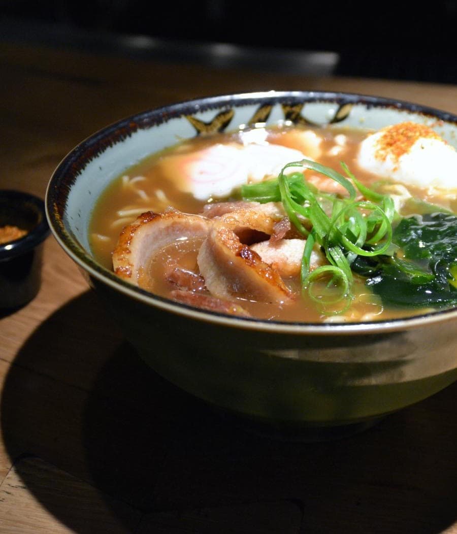 A social post of a ramen bowl in Tokyo, being saved into Roam